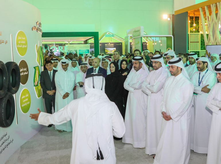 Delegates visiting an exhibition booth